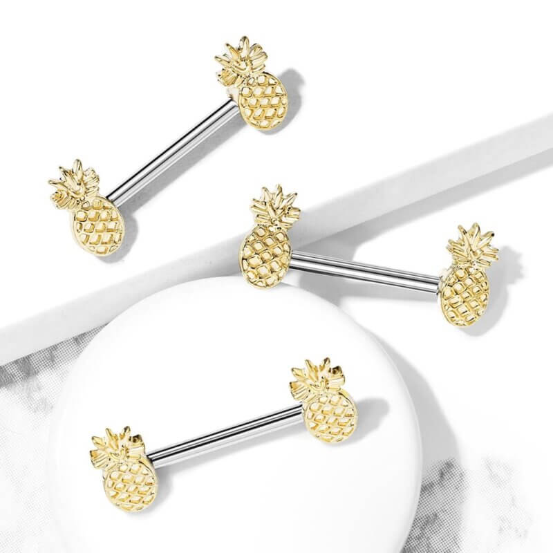 Bröstpiercing med ananas i kirurgiskt stål