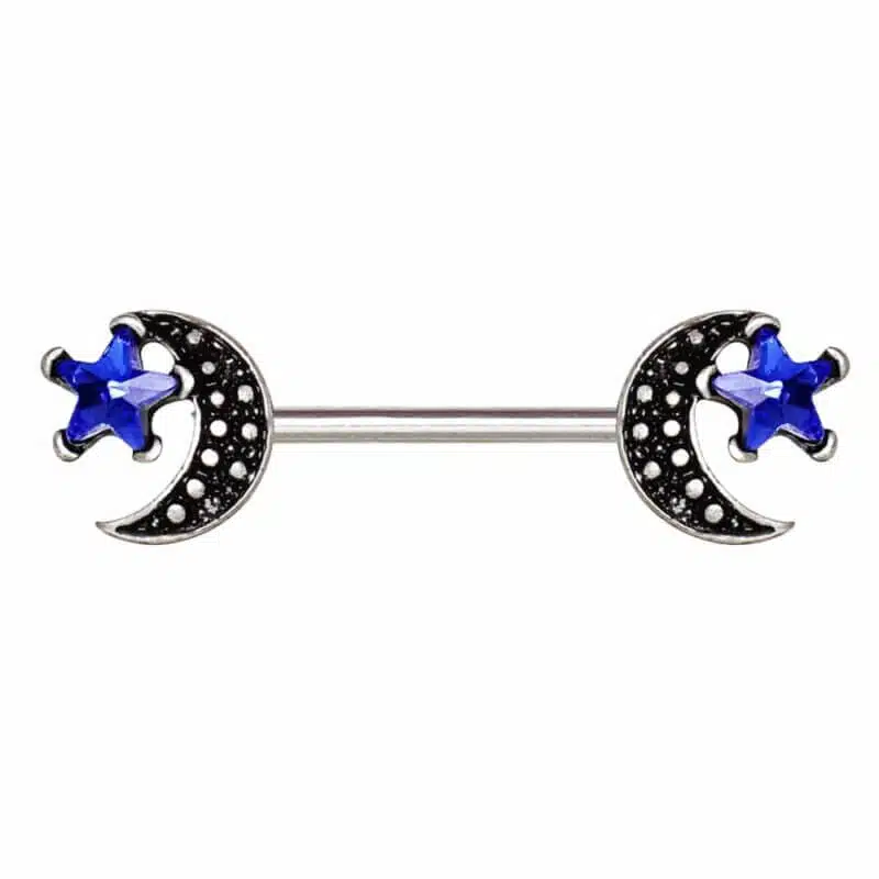 Bröstpiercing med måne och blå stjärna